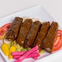 Grape Leaves · Stuffed with rice, tomato, onions, parsley, and lemon juice.