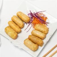 Thai Spring Rolls · Deep fried spring roll, stuffed with soy noodles and mixed vegetables, served with plum sauce.