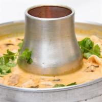 Tom Kah Chicken · Spicy coconut lemongrass soup with mushrooms.