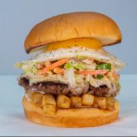 Slaw Burger · impossible patty, white American cheese, fries, Haus slaw, fried egg, and mayo. Hormone and ...