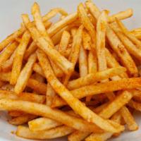 Cajun Fries · Our signature fries tossed with fried cajun spice.