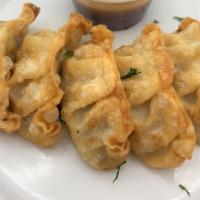 Fried Dumplings (6Pcs) · Six pieces of our pan-fried dumplings.