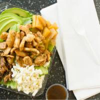 Avocado Salad · Romaine lettuce, caramelized walnuts, chicken, Feta cheese, avocado and pineapples, served w...