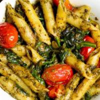 Pesto Pasta · Penne Pasta with homemade pesto, sauteed spinach and roasted cherry tomatoes
