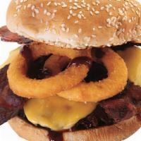 Cowboy Burger · Bbq Sauce, Bacon, Onion Rings, American Cheese,
1/4 Beef Patty, on Squishy White Sesame Seed...