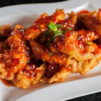 Yangyum Chicken Wings · Crispy fried chicken wings, tossed in house sweet & spicy yangnyeom sauce.