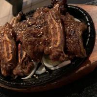 Galbi Ribs · House marinated beef short ribs.