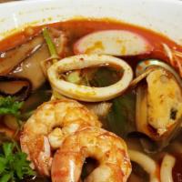 Spicy Seafood Udon · Shrimp, squid, scallop, green mussel, mushroom, jalapeño, udon noodles in seafood udon broth.