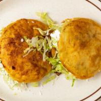 Gorditas · choice of meat lettuce fresh cheese refrie beans sour cream salsa on side