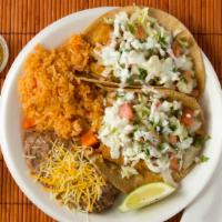 Two Fish Tacos · Served with rice and beans.