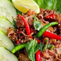 Thai Beef Salad · yum nuea grilled steak toss in lime dressing with cucumber, tomatoes