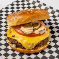Backyard Classic Burger · Angus beef, American cheese, lettuce, tomato, chopped onions, pickles, house burger sauce