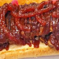Bbq Rib Sandwich · Slow cooked baby back ribs, pickled onions, sweet & smokey BBQ sauce
