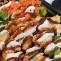 Grilled Chicken Salad · Grilled chicken, tomato, avocado, corn, cilantro, shredded carrots, romaine lettuce - bbq ra...