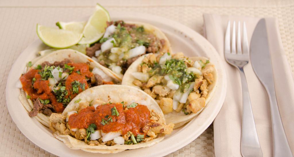 Chicken Taco · Corn Tortilla, Cilantro, Onions,& choice of salsa