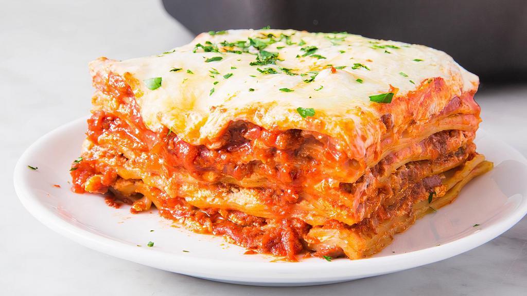 Lasagna Bolognese · Classic Italian lasagna layered with meat sauce and cheese.