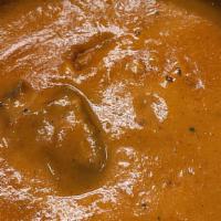 Lamb Tikka Masala · Lamb cooked with herbs and Indian spices in a creamy tomato sauce.
