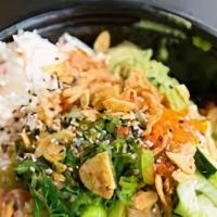 Feel Soy Good · Tofu, edamame, tomatoes, chili flakes, and sesame seeds on a bed of mixed greens with our Or...
