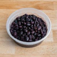 Black Beans · Black beans, onions and garlic.