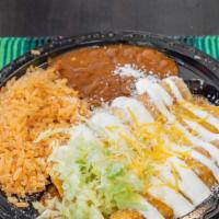 (3)Enchilada Combo · 3 enchiladas with your choice of meat, served with rice and beans.