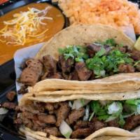 (2)Taco (Maiz) Combo · 2 soft corn tacos with rice & Beans. Your choice of meat.