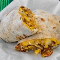 Breakfast Burrito · (*Available only 8am-3pm) Flour Tortilla wrapped with Bacon, Ham, Chorizo, Potato, Eggs, & C...