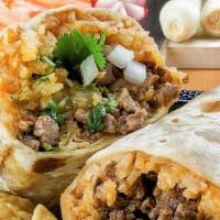 Burritos · Filled with fresh cooked meat, beans, rice, cilantro, onions and green salsa.