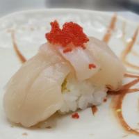 Jumbo Scallop  · Sushi - 2 pieces
Sashimi - 7-8 pieces