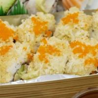 Crunchy Roll · 2 pieces of shrimp tempura, avocado, and crab inside and topped with crunchy tempura flakes ...