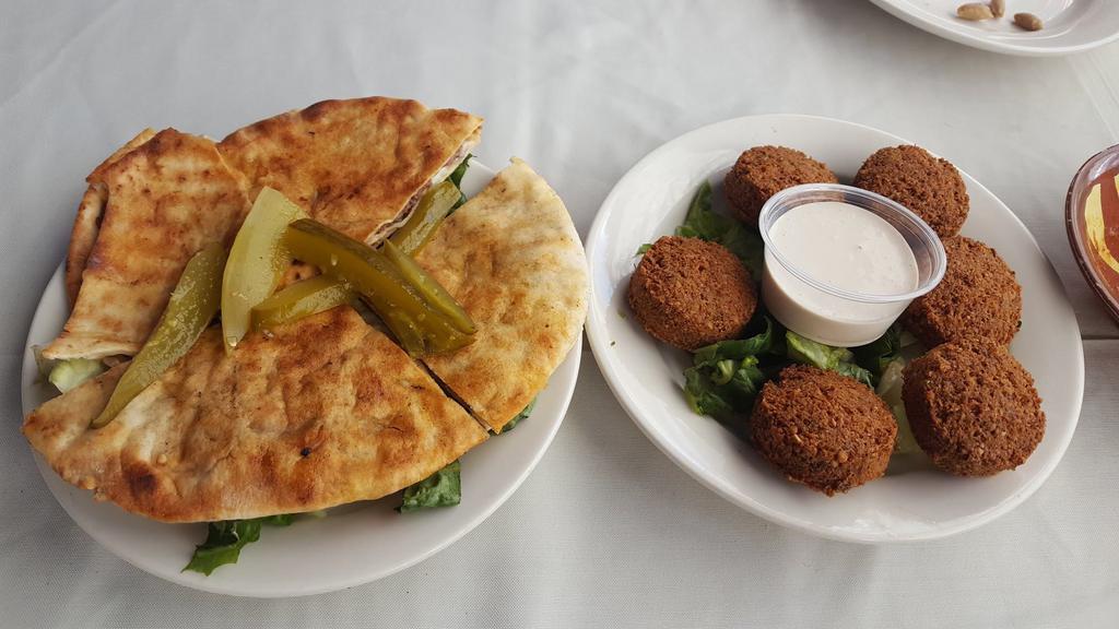 Al Ameera Restaurant · Middle Eastern · American · Salad · Sandwiches