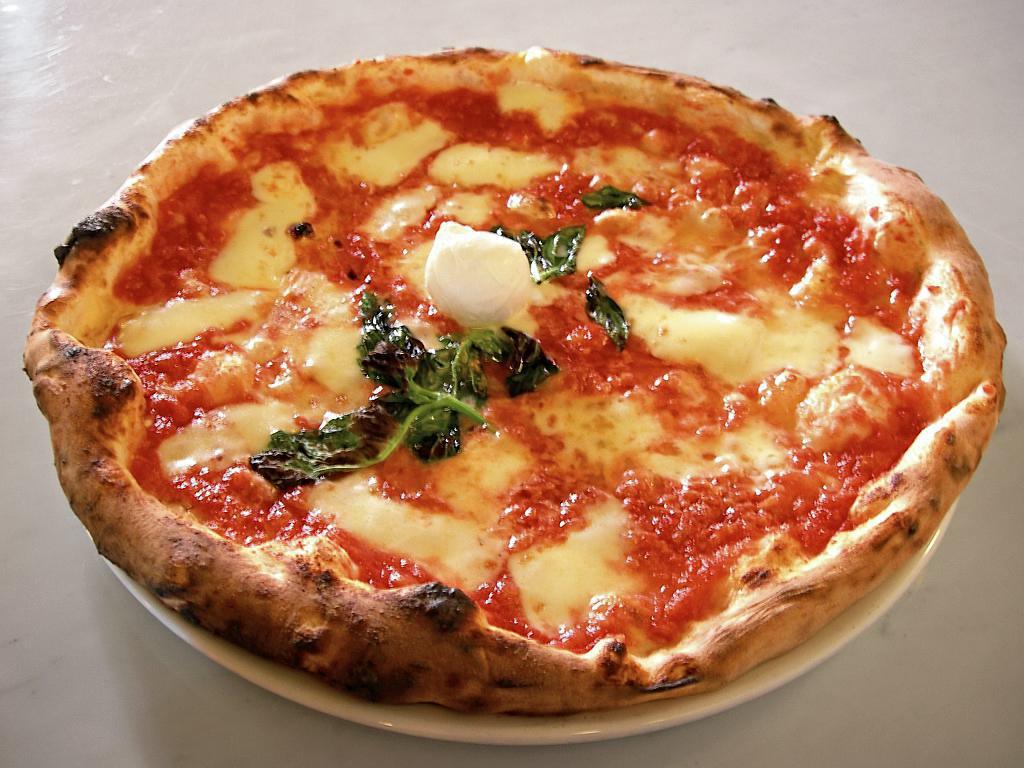 The Pizza Place · Pizza · Salad · Italian · Desserts