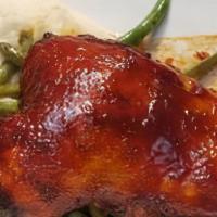 1/2 Bzsoco  Bbq Chicken With 2 Sides · BBQ chicken seasoned with our signature house blend dry rub and topped with our sweet and sp...