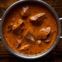 Lamb Vindaloo · Marinated lamb in a spiced curry sauce with potatoes.