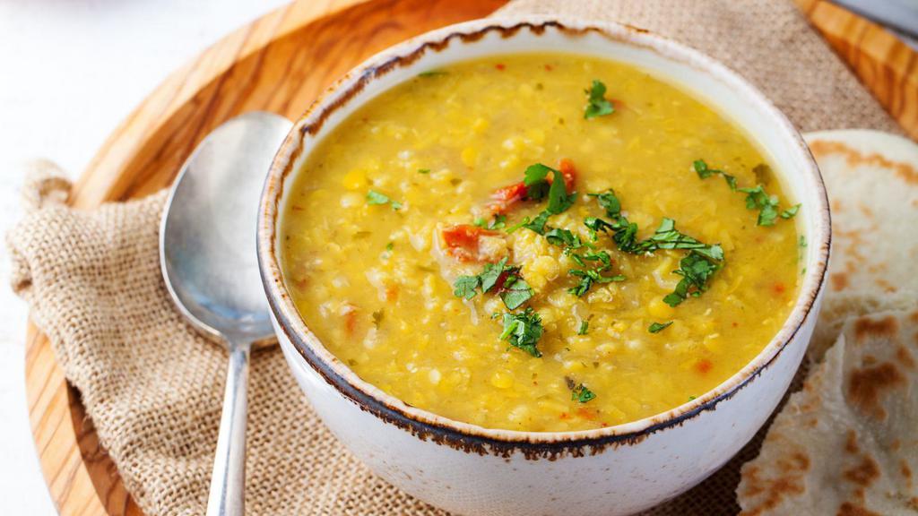 	The Yellow Dal · Famous dal curry made with fresh yellow lentils mixed with chili powder and garlic.