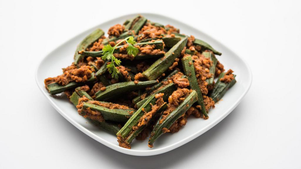 The Bhindi Masala · Farmers market fresh Okra marinated with onions, tomatoes, and Indian spices.