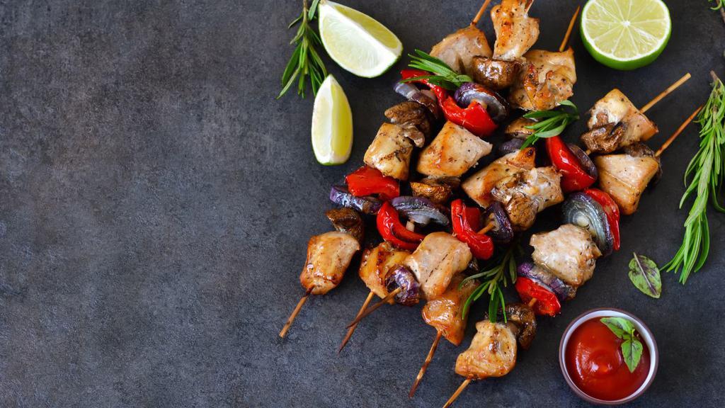 Chicken Kebab · Minced chicken skewers marinated with traditional spices and yogurt then grilled to perfection.