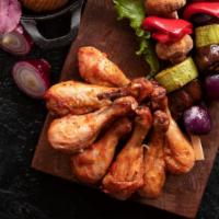 The Mixed Grill · Mixed with Chicken Leg and Chicken Skewers.