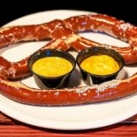 Jumbo Pretzel · Jumbo Bavarian pretzel served with house made Brooklyn lager cheese sauce and spicy mustard ...