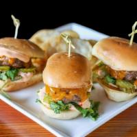 La Sliders  · Mustard grilled burgers cooked to medium, cheddar, lettuce, pickles & burger sauce on mini b...