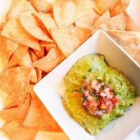 Holy Guacamole  · Avocados, pico de gallo, and chopped jalapenoes. Served with tortilla chips.