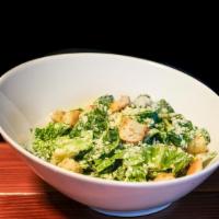 Classic Caesar Salad  · Romaine, croutons, and shaved parmigiano reggiano with homemade Caesar dressing.
