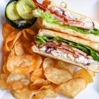 Chicken Salad Sandwich  · Roasted chicken breast with lettuce, tomato, Hellman's mayonnaise, crispy bacon craisins, ce...