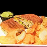 The Cubano  · Sliced pork loin, ham, Swiss, pickles, and cherry pepper mustard on grilled ciabatta with ch...