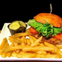 Blackened Mahi Sandwich · Lettuce, tomato, and Jalapeno ranch on toasted brioche with fries.