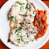 Chicken Parmigiana  · Two hand breaded chicken cutlets topped with homemade marinara sauce and mozzarella served w...