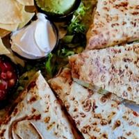 Blackened Chicken Quesadilla · diced blackened chicken, cheddar jack cheese & pico de gallo stuffed in a flour tortilla and...