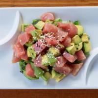 Tuna Tartare  · Finest tuna tossed with avocado and wasabi-lime ponzu sauce. Served on a bed of seaweed salad.