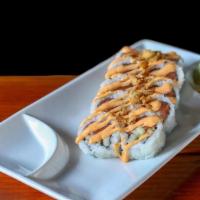 Spicy Salmon Roll  · Spicy salmon, cucumber, sesame seed, finished with crunchy onions, and spicy mayonnaise.