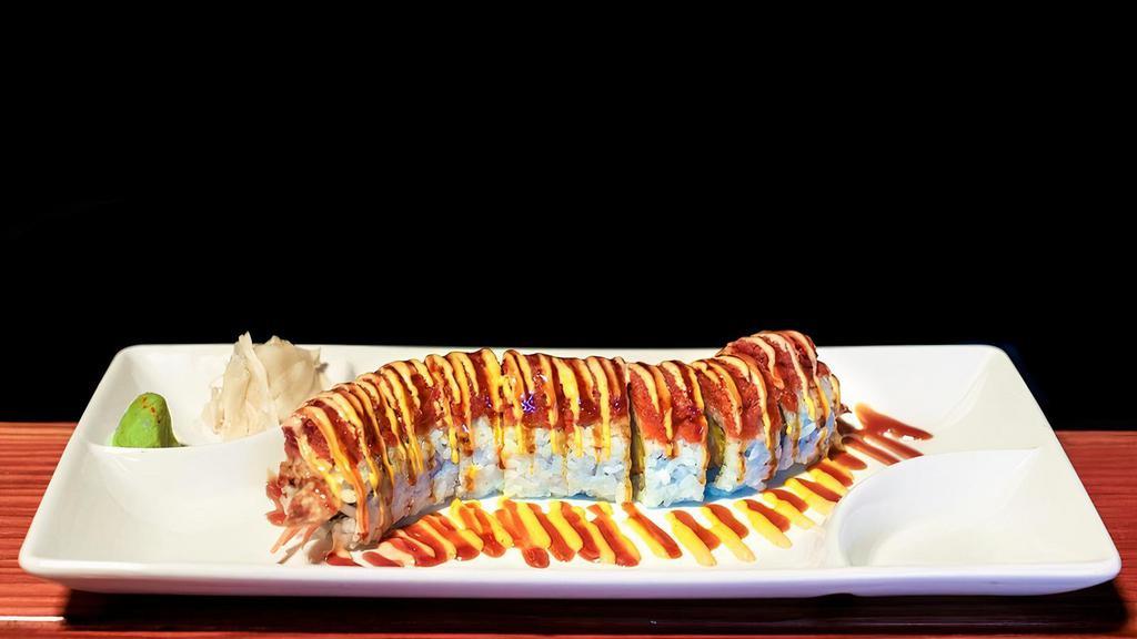 Tempura Dragon Roll  · Tempura shrimp, avocado, carrot, topped with spicy tuna, spicy mayonnaise, and eel sauce.