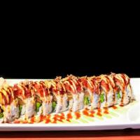 Latitude Roll  · Salmon, avocado, topped with spicy tuna, crunchy onions, eel sauce, and spicy sauce.